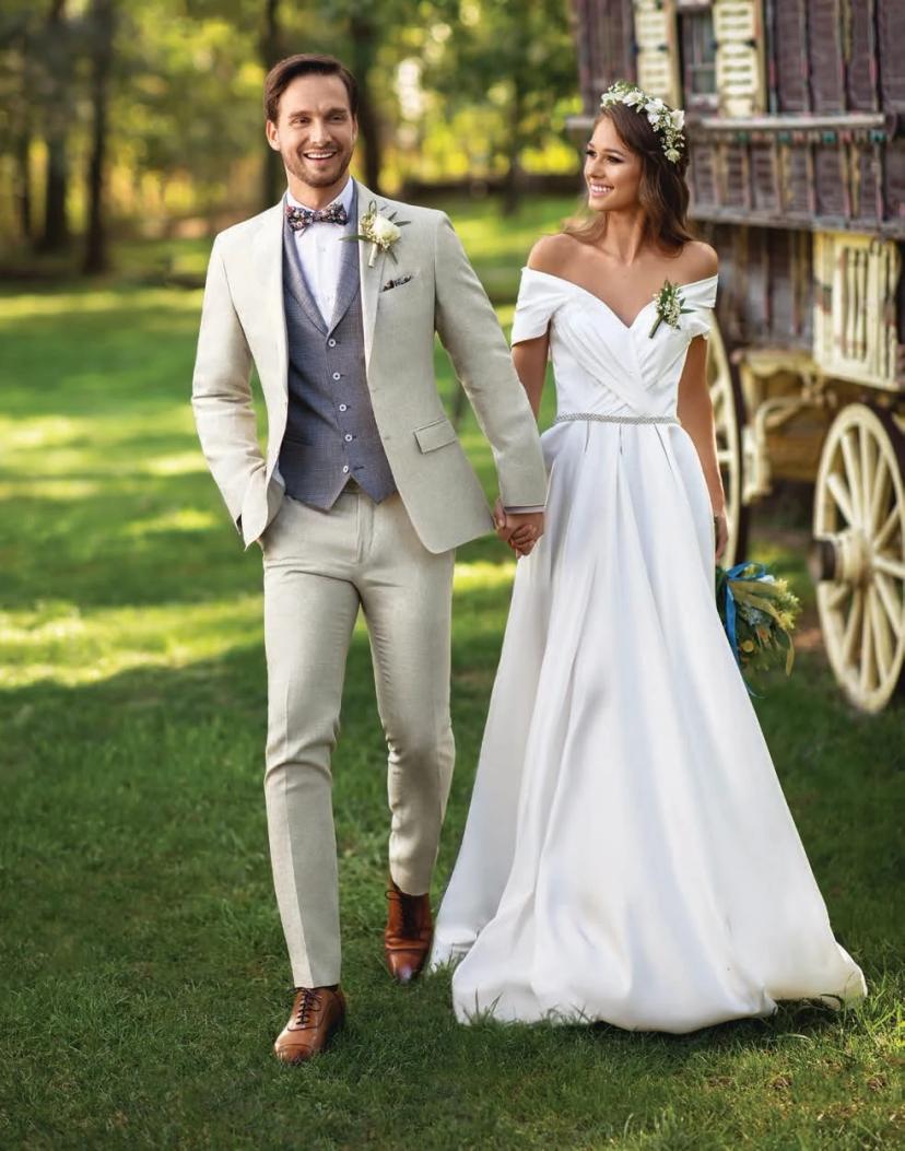 Wife and husband in ceremony outfits